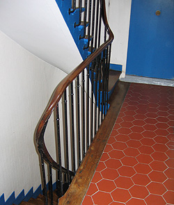 Blue door inside stairwell